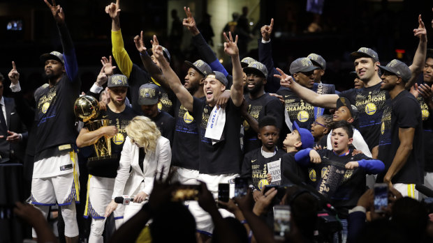 The Golden State Warriors celebrate after defeating the Cleveland Cavaliers 108-85 in Game 4.