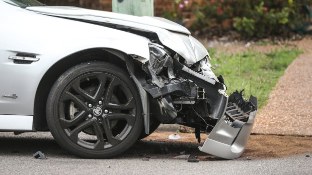 The front of a car involved in a collision in Beach Street before the stabbing.