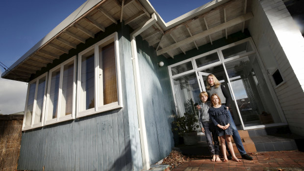 Laura Beilby and her children at their mid-century house in Beaumaris.