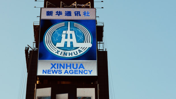 Chinese news agency Xinhua is advertised in New York's Times Square.