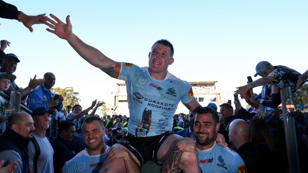 Gallen is chaired off by Wade Graham and Andrew Fifita.