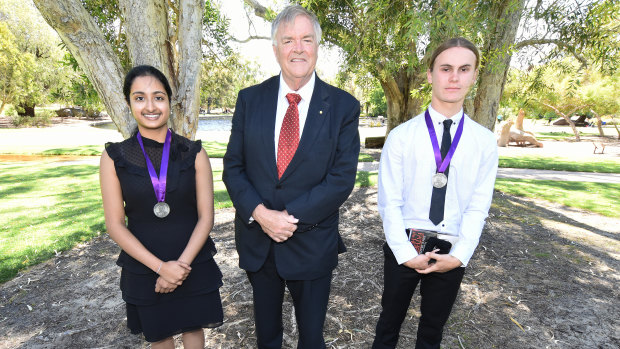 Beazley Medal winners Pooja Ramesh, left, and Jess Haydon with WA Governor Kim Beazley, centre. 