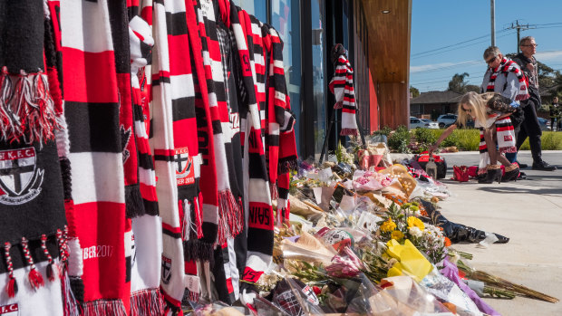 Mourners pay their respects at Moorabbin.