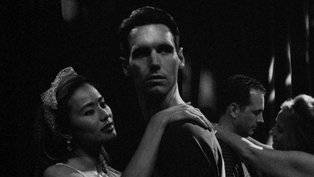 Jamie Chung (left) and Cory Michael Smith in writer and director Yen Tan's 1985. 