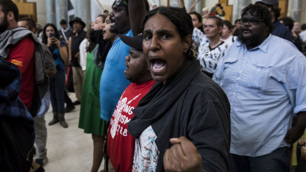Protest against fracking and Indigenous issues in the foyer at Parliament House on Wednesday.