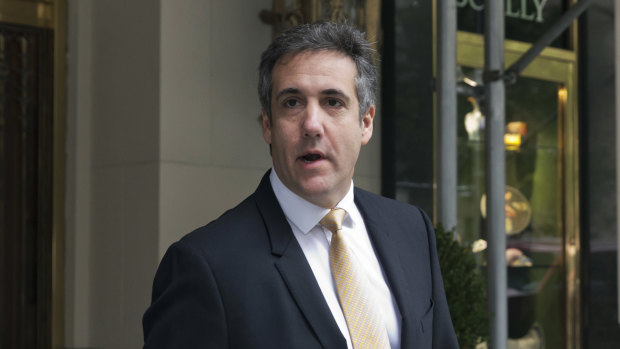 Michael Cohen, former personal lawyer to President Donald Trump, leaves his apartment building in New York on Tuesday.