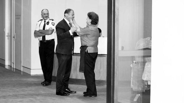 New deputy Liberal leader Josh Frydenberg is congratulated by long-time Parliament House cleaner Anna Jancevski. 