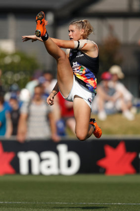 Tayla Harris in full flight. This image was removed from social media by Channel Seven but later reposted with an apology.