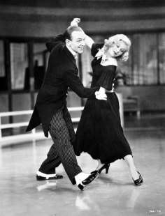 Ginger Rogers with Fred Astaire in the film Swing Time … she made all his moves, but backwards and in high-heels.