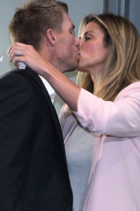 Bracing before the media showdown, David Warner gets a kiss from his wife Candace. 