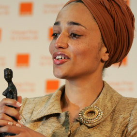 Smith with her trophy after winning the Orange Prize for Fiction for On Beauty in 2006.
