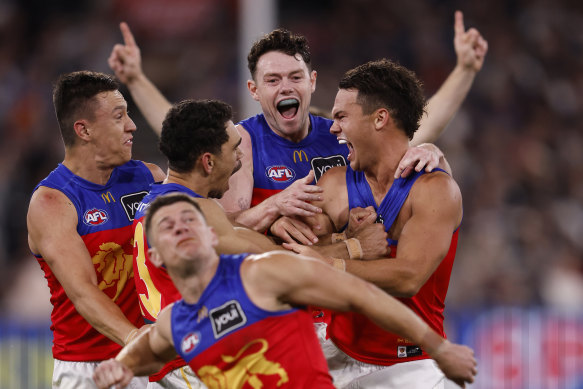 The Lions celebrate a crucial Cam Rayner goal in the final term of the preliminary final.