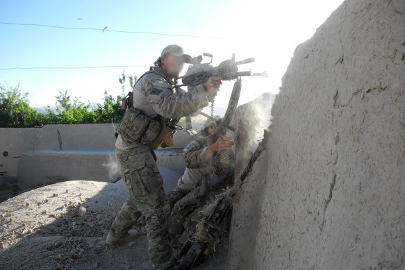 A special forces soldier engages the Taliban in 2011.