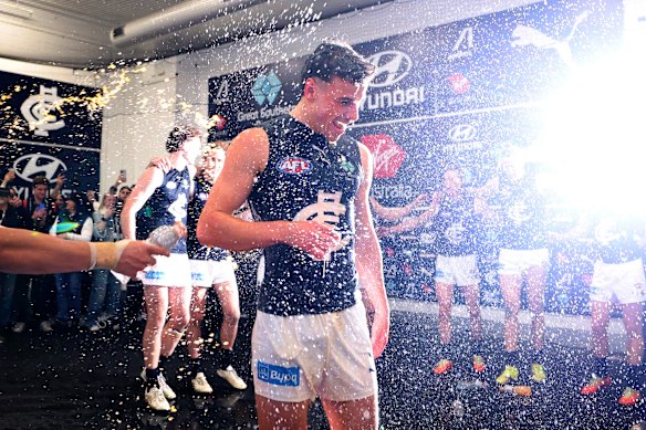 Lucas Camporeale of the Blues receives a Gatorade shower after his side beat the Bombers.