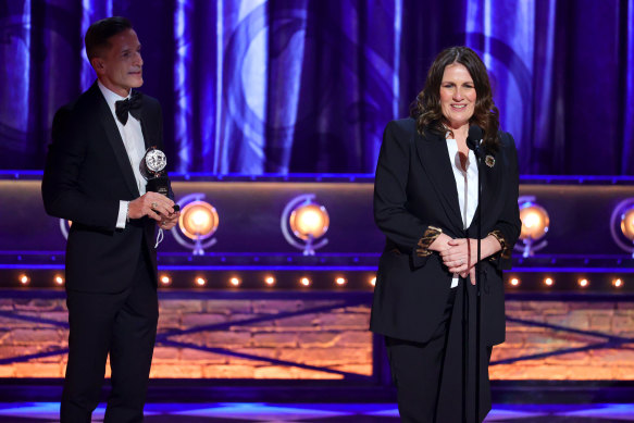 Bill Damaschke and Carmen Pavlovic accept the award for Best Musical for Moulin Rouge! The Musical.