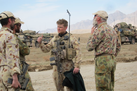 Keith Wolahan (centre) in Kandahar, Afghanistan, in February 2010.  