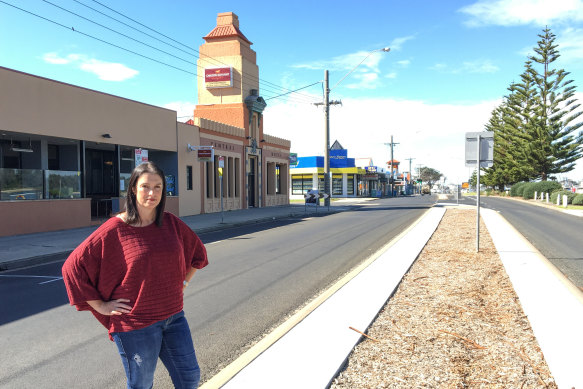 Alison Murphy, owner of Central Hotel, stands on the empty streets of Lakes Entrance.