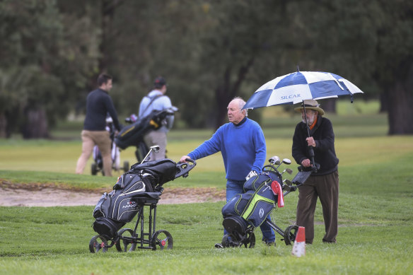 Golfers at Albert Park on the first day allowed in weeks.