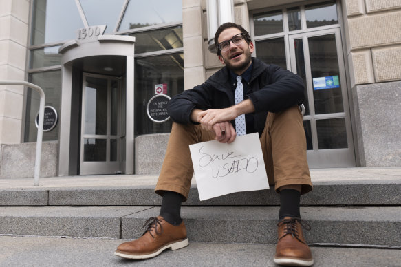 A USAID contract worker outside the agency’s office in Washington.