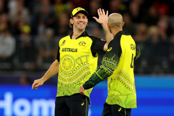Mitchell Marsh and Ashton Agar celebrate a wicket for Australia.