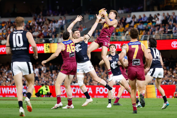 Josh Dunkley flies for a mark.