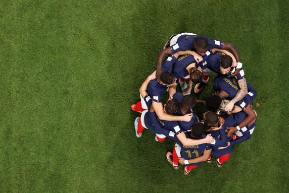 Kylian Mbappe celebrates with teammates after scoring France’s third goal against the Socceroos.