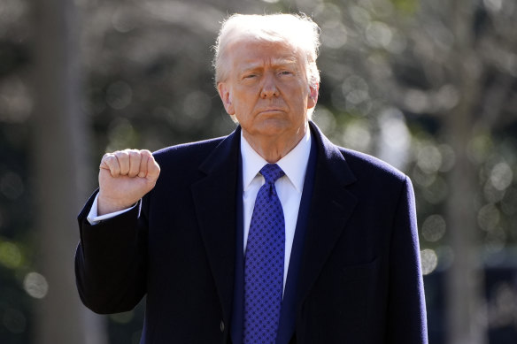 US President Donald Trump walks to board Marine One at the White House on Friday.
