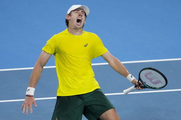 Alex de Minaur celebrates his victory over Alexander Zverev at the United Cup.