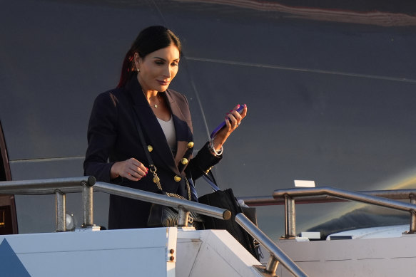 Laura Loomer arriving in Philadelphia with Trump ahead of a presidential debate in September.