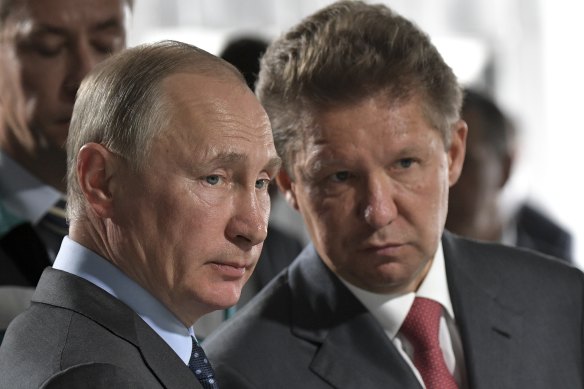 Vladimir Putin with Gazprom CEO Alexey Miller. Russian energy revenues continue to roll in.