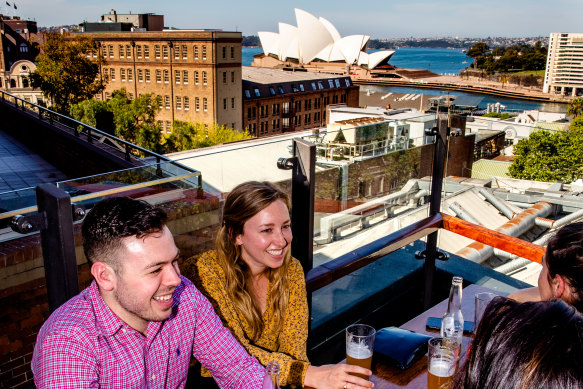 The Glenmore Hotel’s rooftop bar with a view to the Opera House.