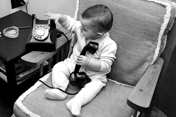 Early adopter Miss M.E. Burke gets to grips with the new number-only telephone on April 9, 1959. 