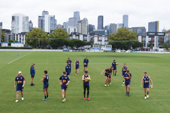 The Lions train at Port Melbourne on Monday morning.