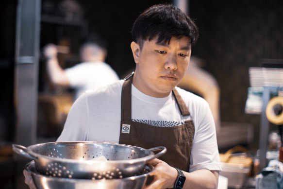 Korean chef Andrew Sung working at Firebird this week.