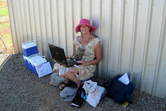 Downes in 2013, waiting for a plane to take her on a Royal Flying Doctor Service clinic run.