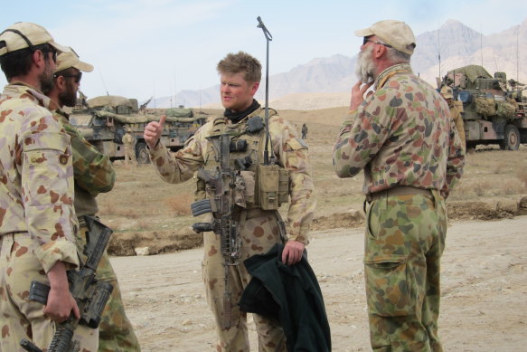 Keith Wolahan (centre) in Kandahar, Afghanistan, in February 2010.  