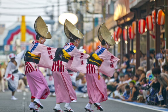 Women in traditional costume perform Awa Odori dance.