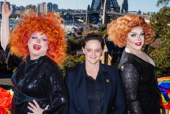 WorldPride chief executive Kate Wickett (centre) is pictured with Raquel Feltch and Karma Bites. The Sydney Harbour Bridge will be closed to traffic for a 50,000-strong pride march.