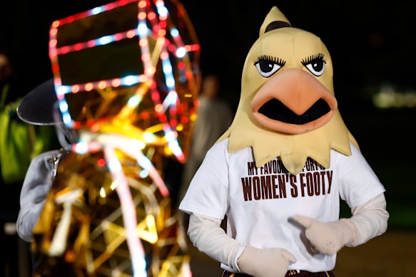 Mascot Hawkette dances pregame.