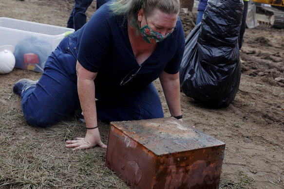 Katherine Ridgway, state archaeological conservator, with the box believed to be the 1887 time capsule put under Confederate General Robert E. Lee statue’s pedestal in Richmond, Virginia.