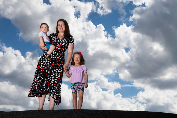 Sarah Smith, with her four-year-old daughter Ariella and 18-month-old son Aidan. She’s returned to work full-time, aided by changes to the childcare subsidy and a flexible workplace model.