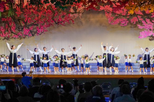 Students perform traditional Korean dances and songs at Aichi Korean Middle and High School open day.