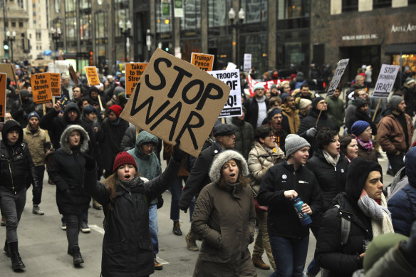 Activists march down Michigan Avenue near Trump Tower in Chicago.