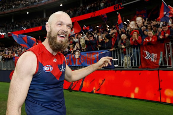 Melbourne skipper Max Gawn celebrates with fans.