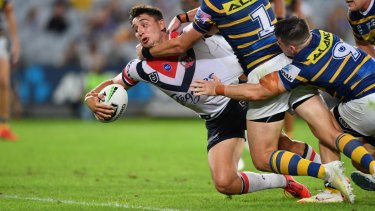 Show of strength: Victor Radley barges over against the Eels.