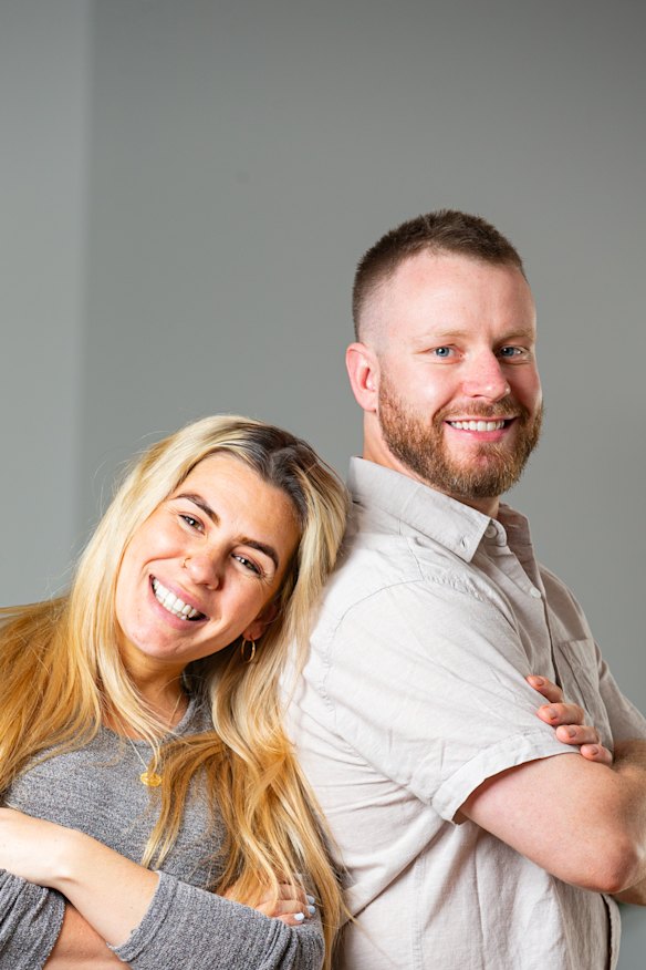 Lucy Banks with her partner at home in Byford, Perth. 