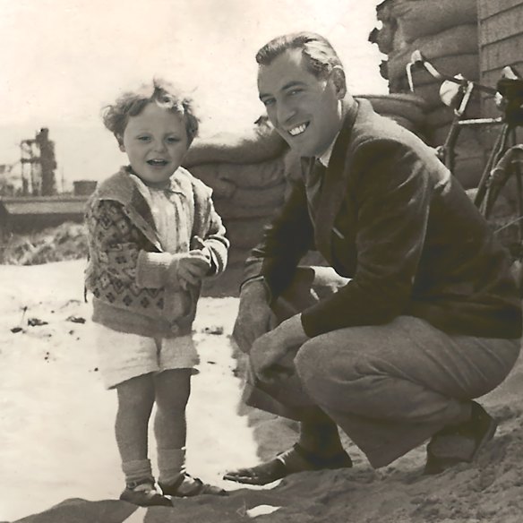 Anthony Hopkins, aged 3, with his father Richard, a baker, at a beach in Wales, 1941.