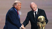FIFA president Gianni Infantino presents Donald Trump with the FIFA Peace Prize in 2025.