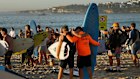 Surfers paddled out at Bondi Beach to pay tribute to the victims of the terror attack.