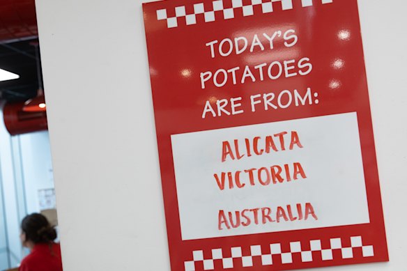 A board near the kitchen lists where the potatoes come from.